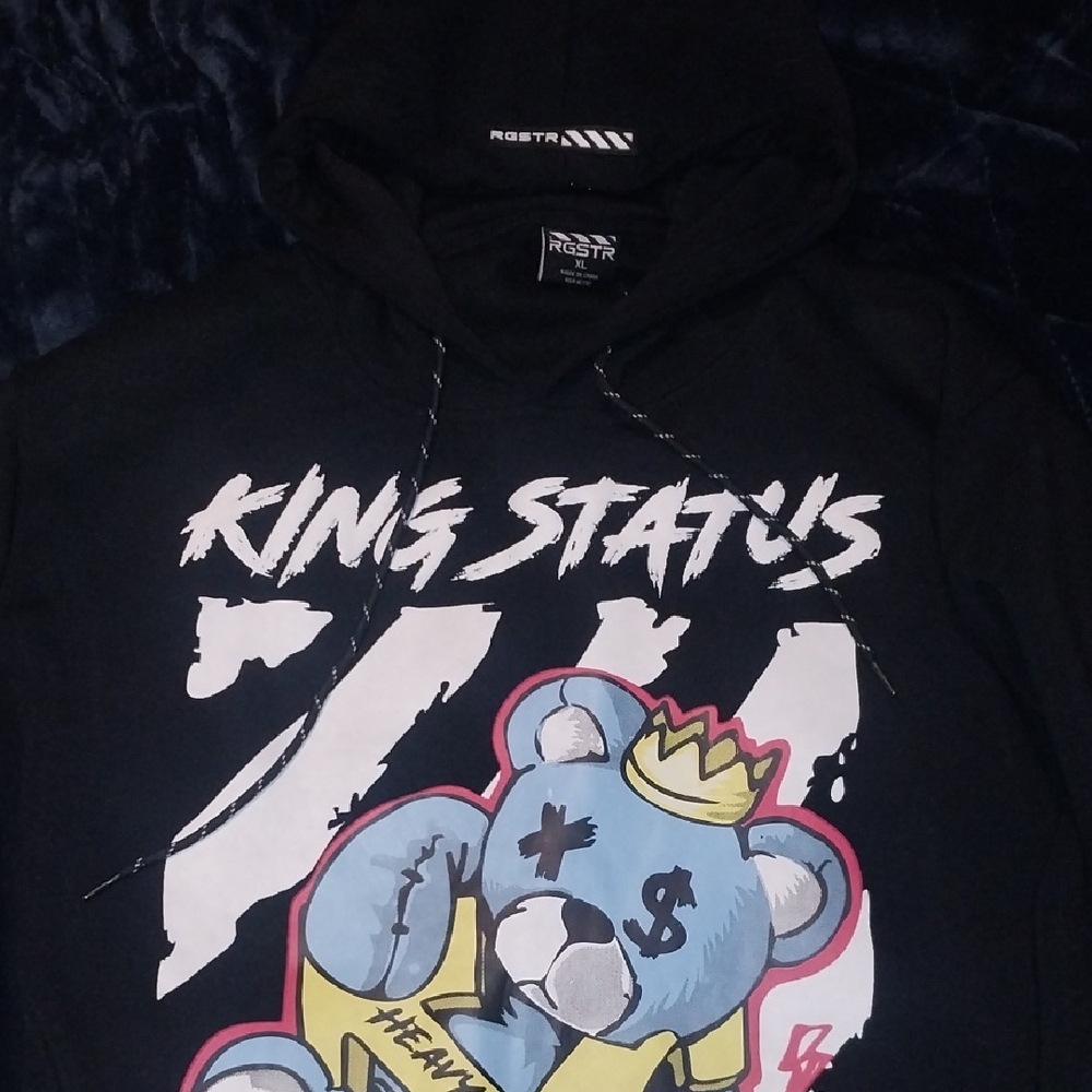 Black Hoodie with Colorful Graphic Design and Playful Koala